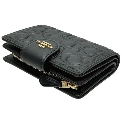 COACH Women’s Signature Embossed Leather Bifold Wallet CZ341