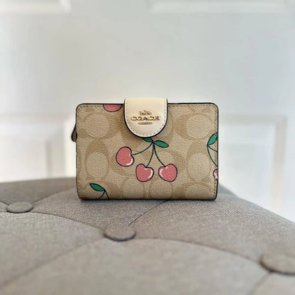 COACH Women’s Signature Bifold Wallet with Cherry Print CF401