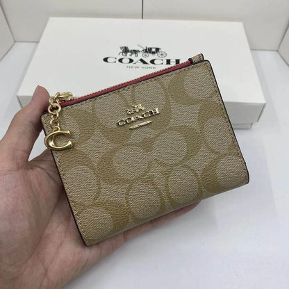COACH Women’s Signature Canvas Card Holder 78002