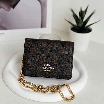 COACH Women’s Signature Canvas Mini Wallet on a Chain CZ278