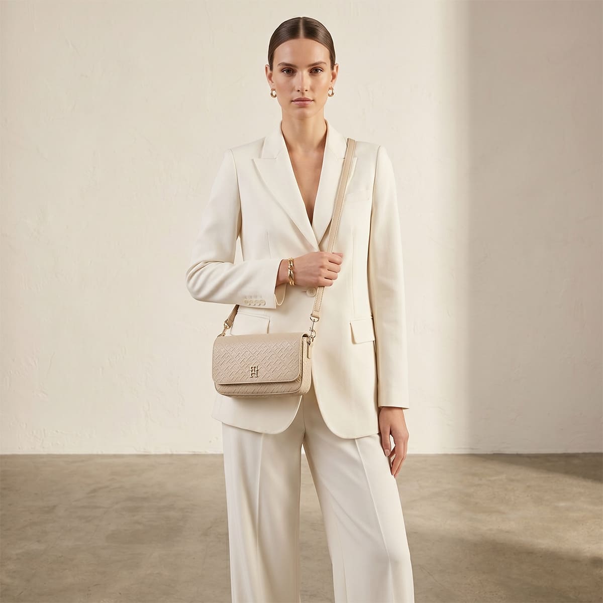 Tommy Hilfiger Beige Monogram Embossed Women’s Crossbody Bag with Gold Hardware